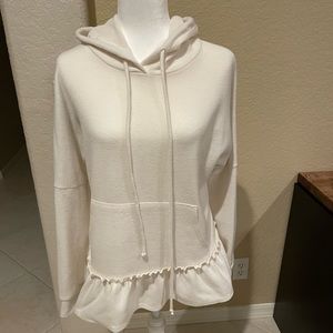 White pullover with frill bottom